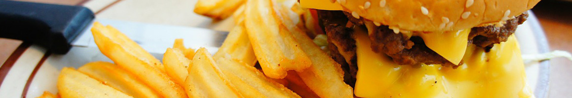 Eating Burger at Downtown Burgers restaurant in Austin, TX.